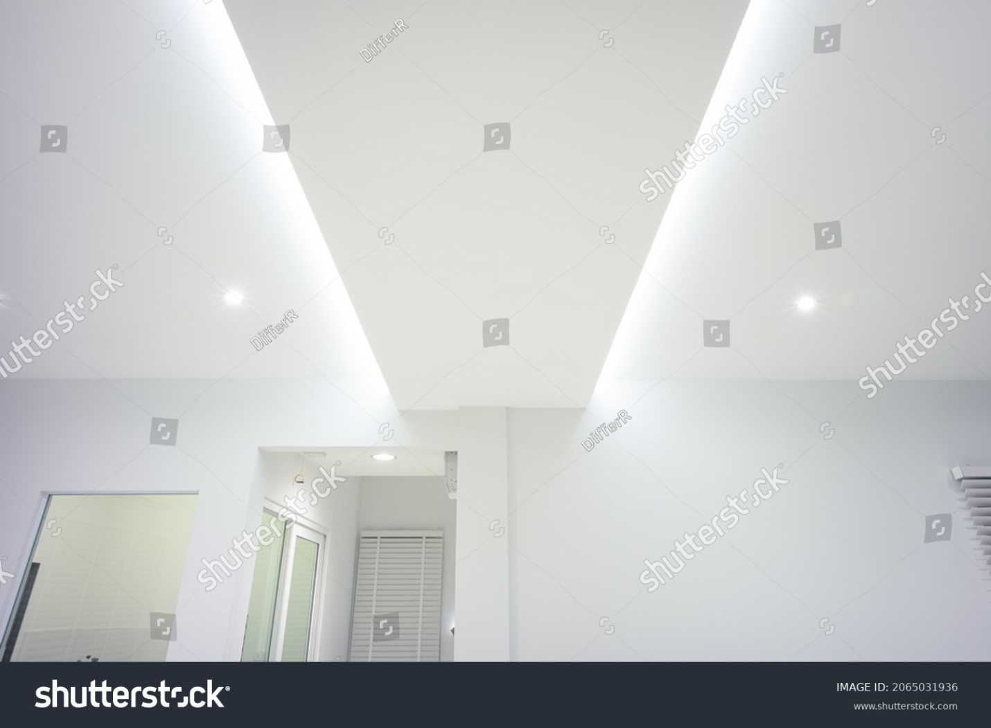 stock-photo-led-strip-light-and-illumination-also-called-ribbon-light-or-led-tape-to-suspended-on-ceiling-in-2065031936.jpg